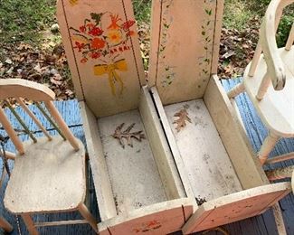 Unusual doll beds with applied decorations