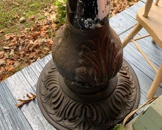 Metal base of a massive table