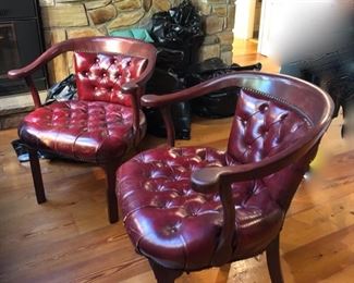Pair leather arm chairs