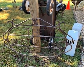 The dusty rose metal sign