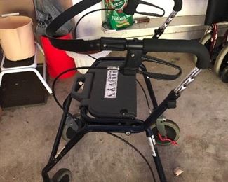 walker with brakes and a seat