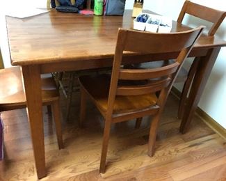 Wooden table with 4 chairs; nice size