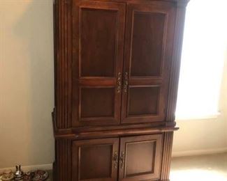 Entertainment Center/TV cabinet
Measures 50” across x 27” deep x 80” tall.