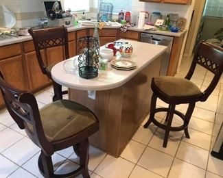 Three large swivel barstools