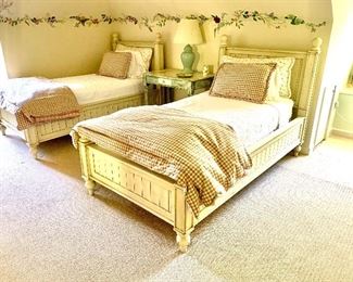 Two twin painted beds, mattresses and custom bed linens