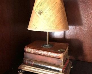 Small desk lamp with real books as base