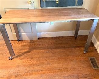 Industrial wood/metal table with caster wheels