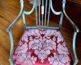Painted arm chair with cane seat and upholstered cushion