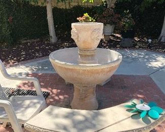 Cement benches.  Cement fountain 