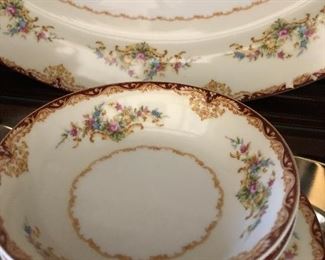 Vintage Hand-painted China set.  Great for  holidays. Many place settings and serving pieces 