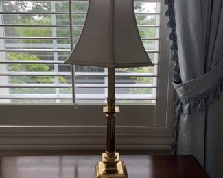 Table lamp, brass with cream shade.