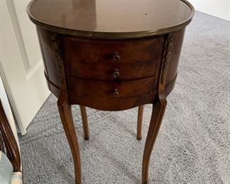 End table, three drawer with bellflower trim.