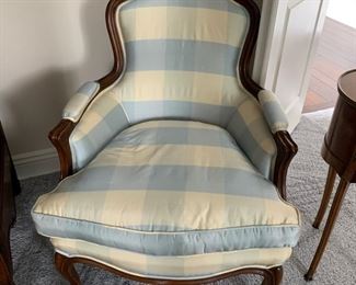 Pair Louis XV-style Bergere chairs, upholstered in blue and white striped taffeta fabric.