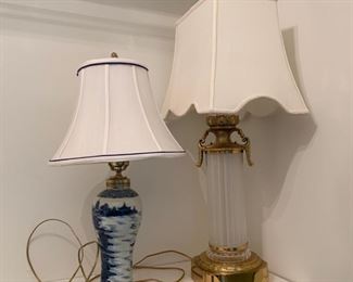 Table lamps, brass and ceramic with cream silk shades.