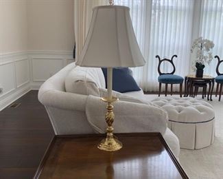 Brass Candlestick lamp with white shade and finial.
