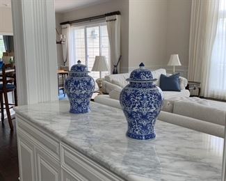 Collection of blue and white Chinoiserie urns, plates, candlesticks and others.