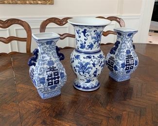 Collection of blue and white Chinoiserie urns, plates, candlesticks and others.