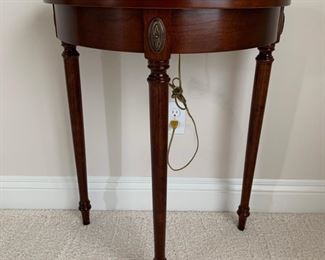 Demi Lune table, brass hardware.