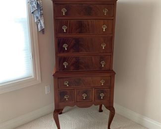 Hi-Boy, 8 drawer, brass hardware, on short cabriole legs.