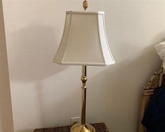 Table lamp, brass with cream shade and finial.