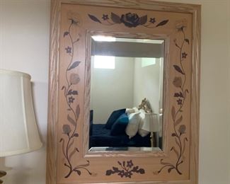Floral wall mirror.