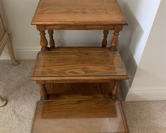 Decorative step display unit with glass top.