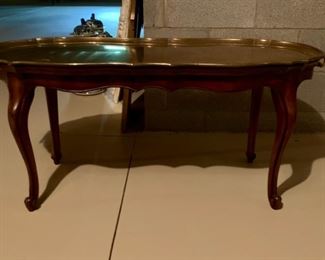 Table with removable brass tray top.