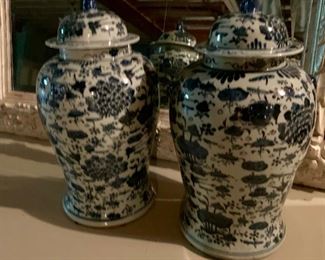 Blue & white Chinoiserie vases, foo dog finials.