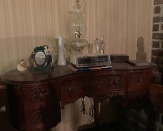 Beautiful carved wood kidney shaped desk, Oil Lamp and many unique decorative pieces