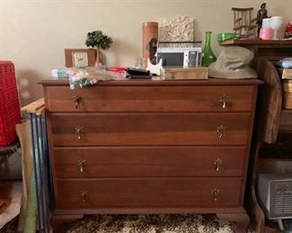 Four drawer chest of drawers portable radios and clocks