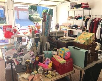 Garage full of household items, clothes, art, & more.