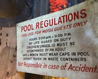 Vintage metal Pool Regulations sign