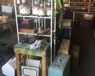 Bakers rack and vintage luggage