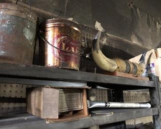 Vintage advertisement tins and horns