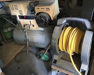 Large craftsman compressor, hoses and connections.