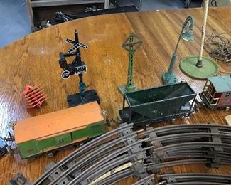 Lionel train set, lights crossing guard, flag pole, and much more.