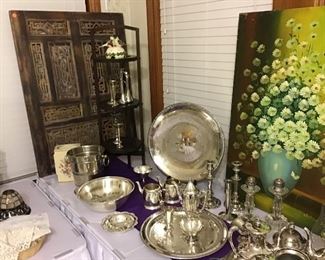 Silver plate coffee service sets. Bud vases, candle stick holders. Ice buckets, etc...