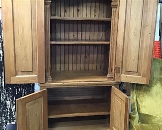 Charbonnet Charbonnet , renowned custom furniture builders, armoire / entertainment case. Interior shows adjustable shelves. Does include an articulating pull out shelf not shown.