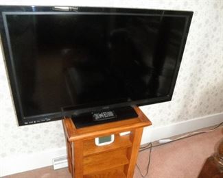 ONE OF MANY FLAT SCREEN TVS
