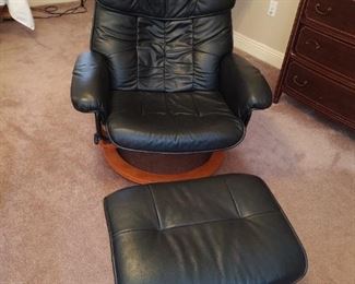 Black Swivel and Reclining Chair with ottoman