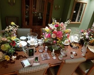 Selection of Waterford, floral arrangements and china