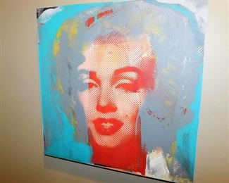 Marilyn Monroe. We have a larger one, which this it, and a series set of 4 of Marilyn/