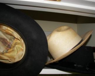 cowboy hats and dress hats both men's and women's