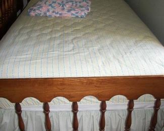 one of a pair or twin beds