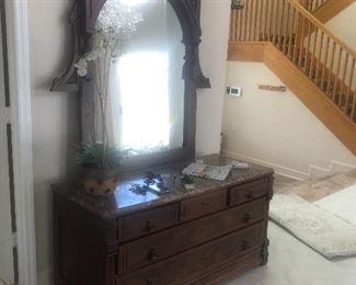 FANTASTIC IMPERIAL DRESSER WITH HUGE ORNATELY CARVED MIRROR AND MARBLE TOP 
53”L x 23”D x 20” H 
Mirror :  60” H x 48” W x 6” D 
