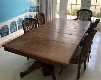 MARRIED DINING TABLE WITH 2 PEDESTAL BASE LEGS AND 4 LEAFS 
80”L x 42” W x 28 &1/2 “ H 