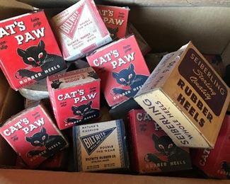 Box full of Cat's Paw Shoe Heels in original boxes