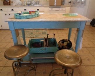 GRANITE TOPPED KITCHEN ISLAND WITH ROLLERS