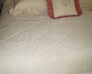 full size bed with storage in headboard