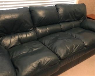 green leather sofa nice condition